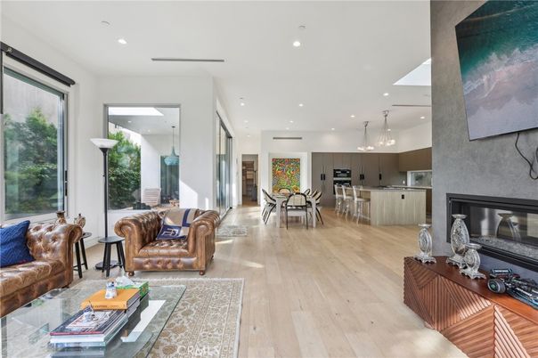 Dining room, Fireplace, Interior, Kitchen, Living room, Pendant Lights, Recessed Lighting, Stainless Steel Appliances, Wood Texture Flooring