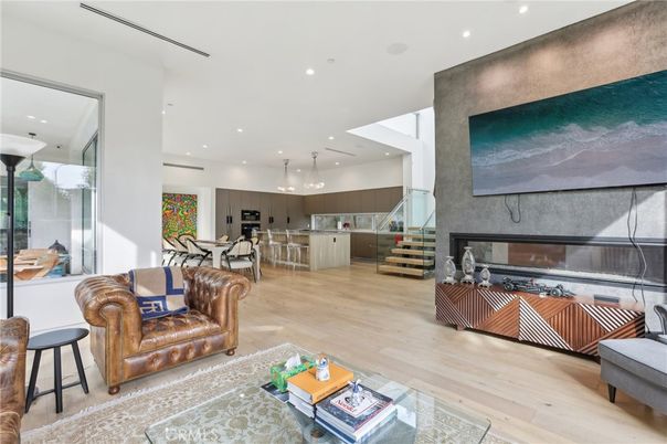 Dining room, Fireplace, Interior, Kitchen, Living room, Pendant Lights, Recessed Lighting, Stainless Steel Appliances, Wood Texture Flooring