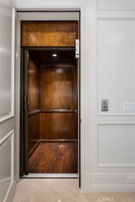 Elevator, Interior, Recessed Lighting, Wooden Ceilings, Wood Texture Flooring, Wooden Walls