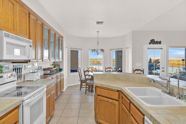 Chandelier, Dining room, Interior, Kitchen, Pendant Lights, Tile Countertops, Water
