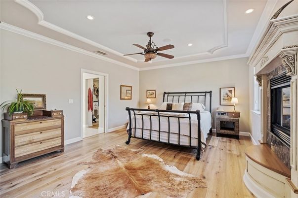 Bedroom, Fireplace, Interior, Recessed Lighting, Wood Texture Flooring