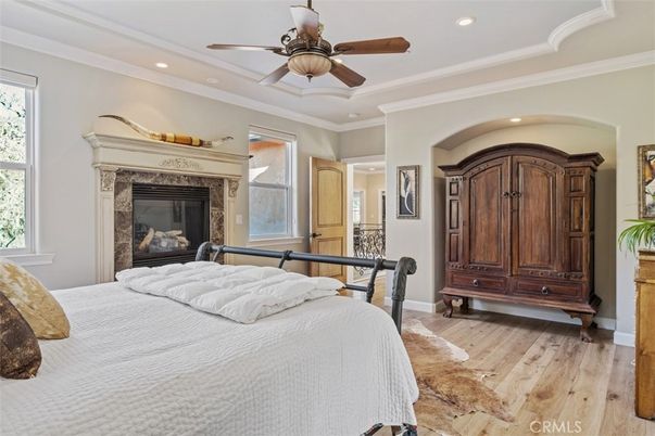 Bedroom, Fireplace, Interior, Recessed Lighting, Wood Texture Flooring
