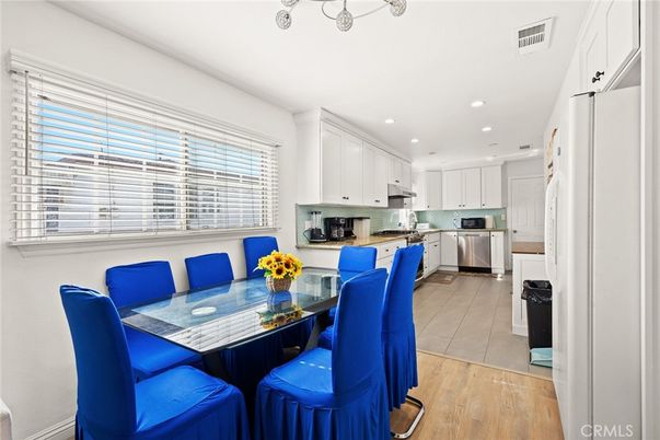 Dining room, Interior, Kitchen, Recessed Lighting, Stainless Steel Appliances, Wood Texture Flooring