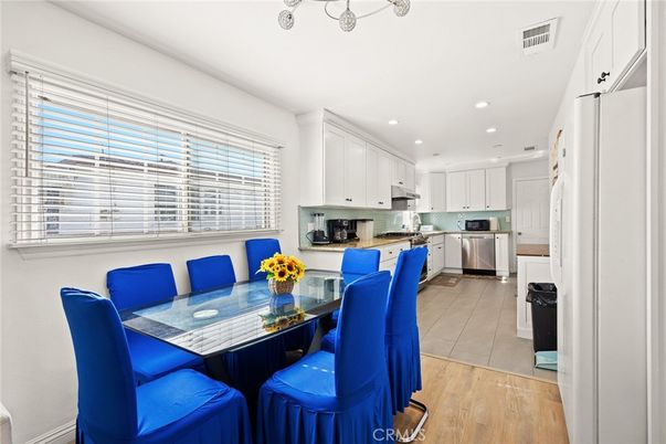 Dining room, Interior, Kitchen, Recessed Lighting, Stainless Steel Appliances, Wood Texture Flooring