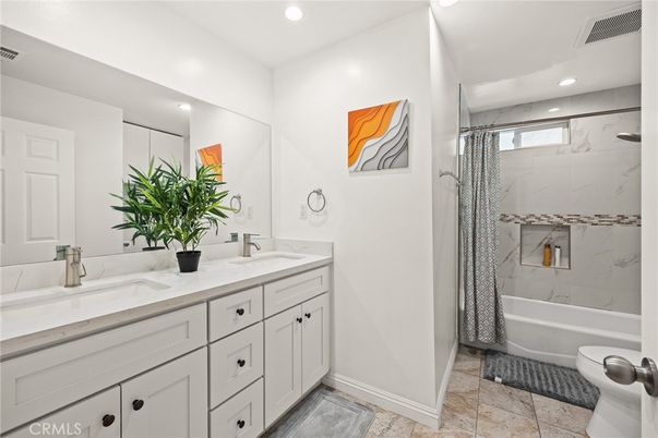 Bathroom, Dual Sink Vanities, Interior, Marble Walls, Recessed Lighting