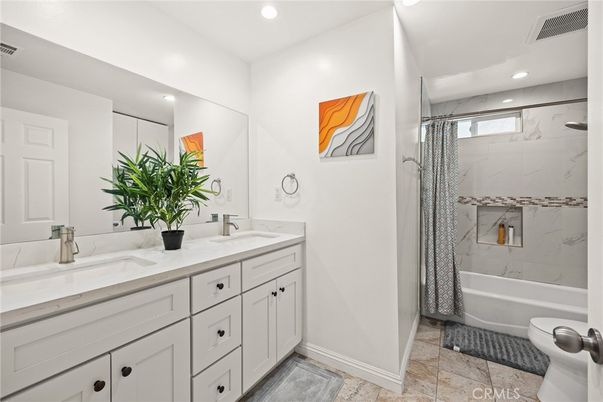 Bathroom, Dual Sink Vanities, Interior, Marble Walls, Recessed Lighting