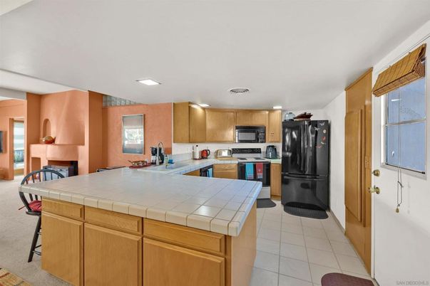 Interior, Kitchen, Recessed Lighting, Stainless Steel Appliances, Tile Countertops