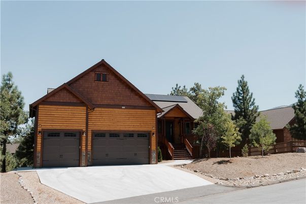 Attached, Exterior, Facade, Solar Panels, Log Home