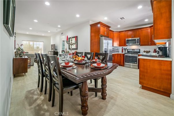 Dining room, Interior, Kitchen, Recessed Lighting, Stainless Steel Appliances, Wood Texture Flooring
