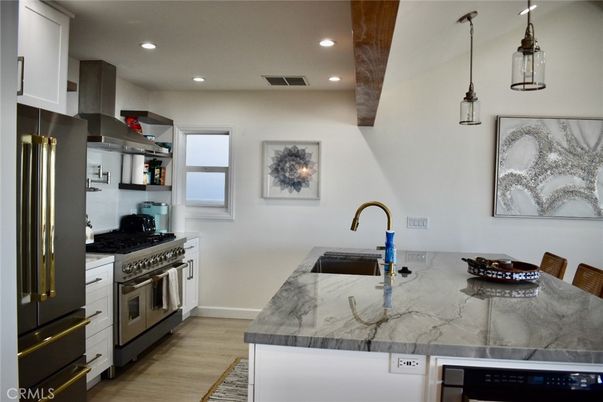 Interior, Kitchen, Pendant Lights, Recessed Lighting, Stainless Steel Appliances, Wooden Beams, Wood Texture Flooring