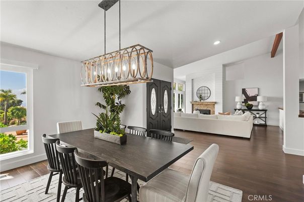 Dining room, Fireplace, Interior, Living room, Pendant Lights, Recessed Lighting, Wood Texture Flooring