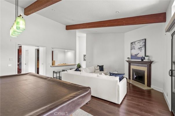 Fireplace, Interior, Living room, Pendant Lights, Recessed Lighting, Wooden Beams, Wood Texture Flooring