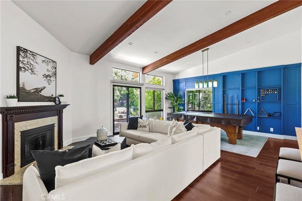 Billiard Table, Fireplace, Game Room, Interior, Living room, Pendant Lights, Recessed Lighting, Wooden Beams, Wood Texture Flooring