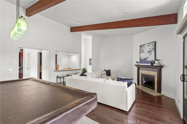Fireplace, Interior, Living room, Pendant Lights, Recessed Lighting, Wooden Beams, Wood Texture Flooring