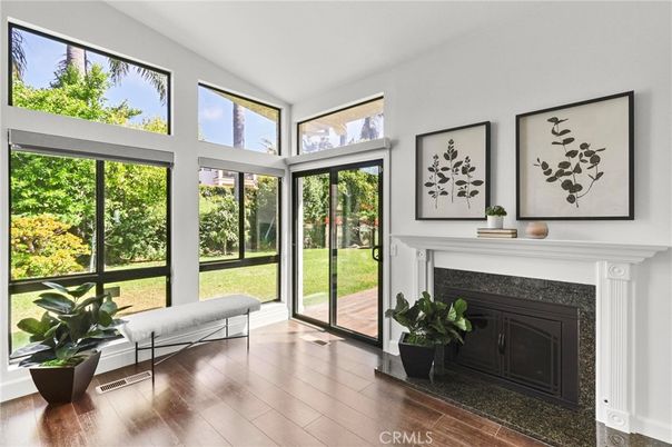 Fireplace, Interior, Sun Room, Wood Texture Flooring