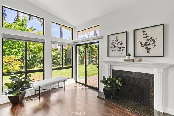 Fireplace, Interior, Sun Room, Wood Texture Flooring