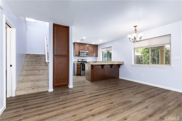 Chandelier, Interior, Kitchen, Recessed Lighting, Stainless Steel Appliances, Wood Texture Flooring
