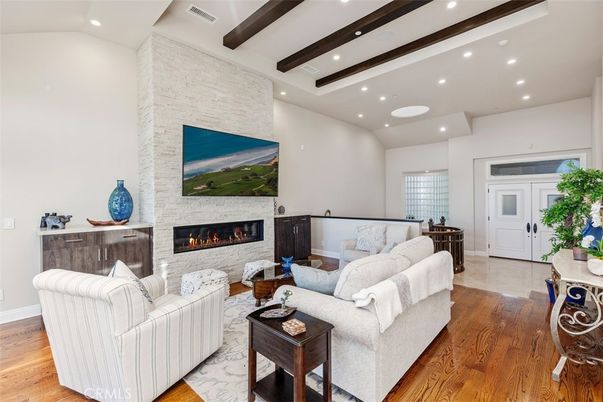 Fireplace, Interior, Living room, Recessed Lighting, Stone Walls, Wooden Beams, Wood Texture Flooring