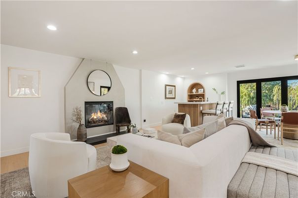 Dining room, Fireplace, Interior, Living room, Recessed Lighting, Wood Texture Flooring