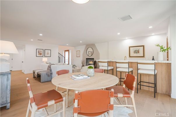 Dining room, Fireplace, Interior, Living room, Recessed Lighting, Wood Texture Flooring