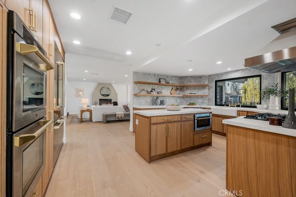 Fireplace, Interior, Kitchen, Living room, Recessed Lighting, Stainless Steel Appliances, Wood Texture Flooring