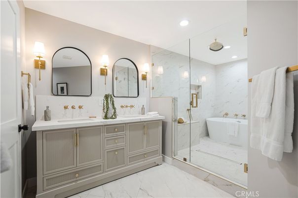 Bathroom, Dual Sink Vanities, Free Standing Baths, Glass Shower, Interior, Marble, Marble Walls, Recessed Lighting