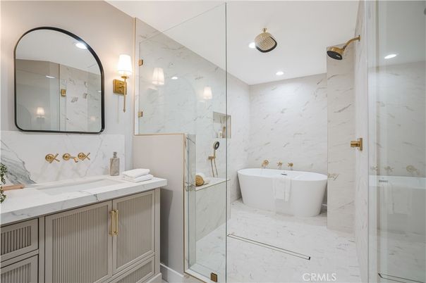 Bathroom, Dual Sink Vanities, Free Standing Baths, Glass Shower, Interior, Marble, Marble Walls, Recessed Lighting