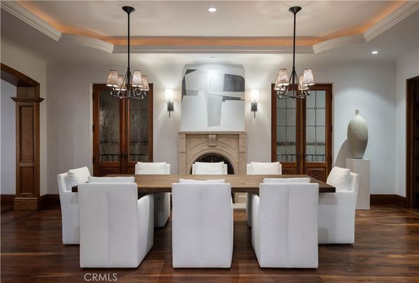 Chandelier, Dining room, Fireplace, Interior, Pendant Lights, Recessed Lighting, Wood Texture Flooring