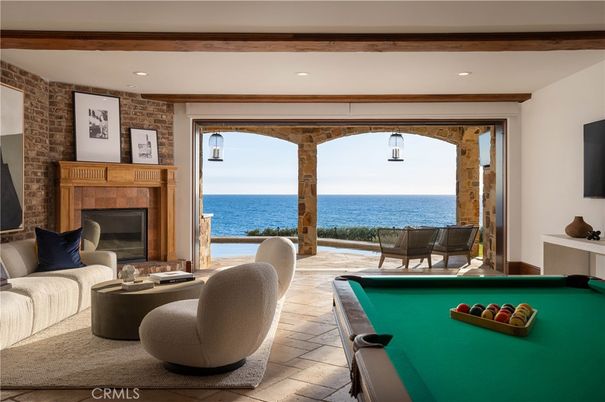 Billiard Table, Fireplace, Game Room, Interior, Recessed Lighting, Stone Walls, Water
