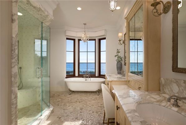 Bathroom, Chandelier, Dual Sink Vanities, Free Standing Baths, Glass Shower, Interior, Marble Walls, Recessed Lighting, Water