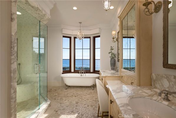 Bathroom, Chandelier, Free Standing Baths, Glass Shower, Interior, Marble Walls, Recessed Lighting, Water