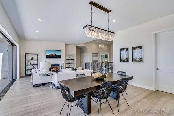 Chandelier, Dining room, Fireplace, Interior, Living room, Recessed Lighting, Wood Texture Flooring