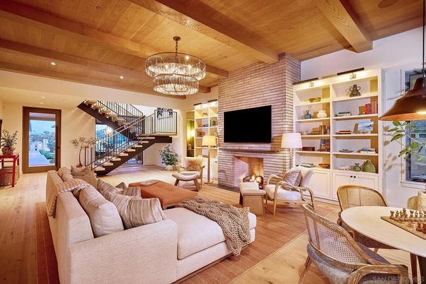 Chandelier, Dining room, Fireplace, Interior, Living room, Recessed Lighting, Stone Walls, Wooden Beams, Wooden Ceilings, Wood Texture Flooring