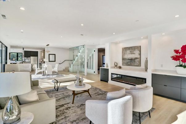 Dining room, Fireplace, Interior, Living room, Pendant Lights, Recessed Lighting, Wood Texture Flooring