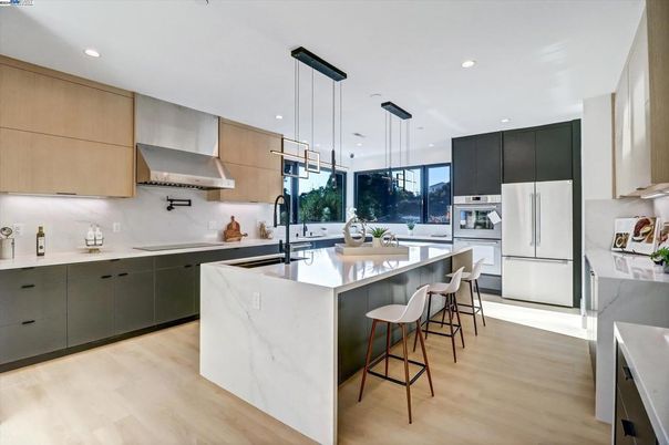 Interior, Kitchen, Pendant Lights, Recessed Lighting, Stainless Steel Appliances, Wood Texture Flooring