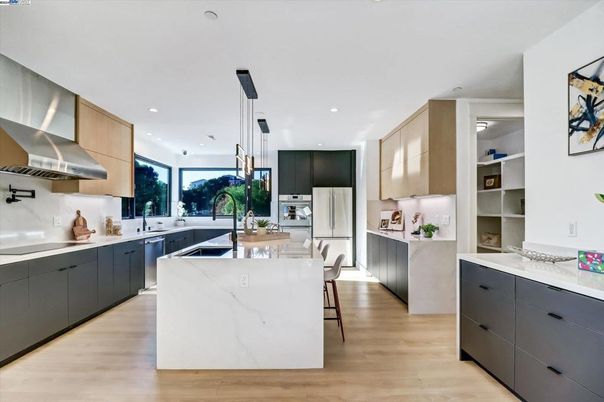 Interior, Kitchen, Pendant Lights, Recessed Lighting, Stainless Steel Appliances, Wood Texture Flooring