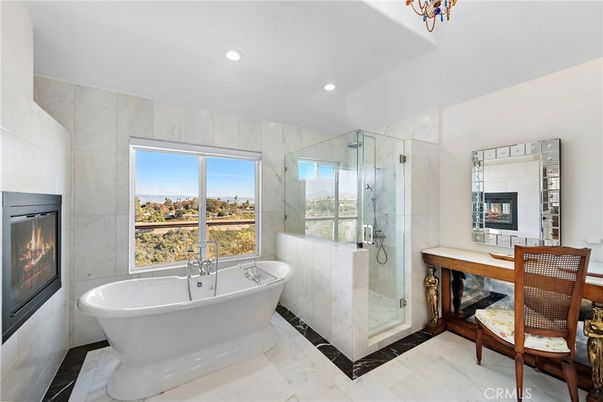 Bathroom, Fireplace, Free Standing Baths, Glass Shower, Interior, Marble Walls, Recessed Lighting