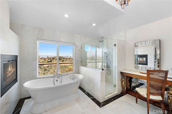 Bathroom, Fireplace, Free Standing Baths, Glass Shower, Interior, Marble Walls, Recessed Lighting