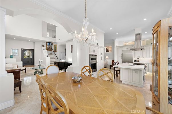 Chandelier, Dining room, Interior, Kitchen, Living room, Piano, Recessed Lighting, Stainless Steel Appliances