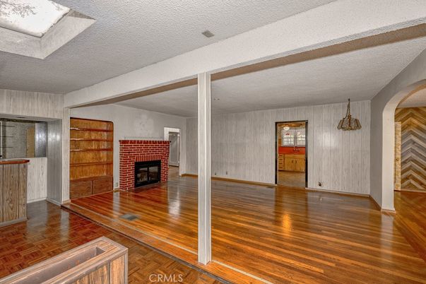 Empty room, Fireplace, Interior, Pendant Lights, Wood Texture Flooring
