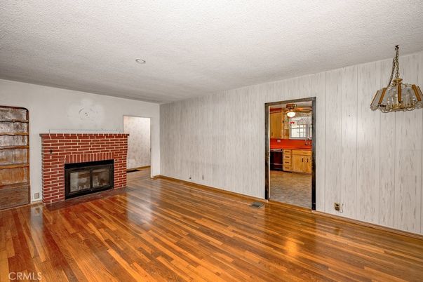 Empty room, Fireplace, Interior, Pendant Lights, Wood Texture Flooring