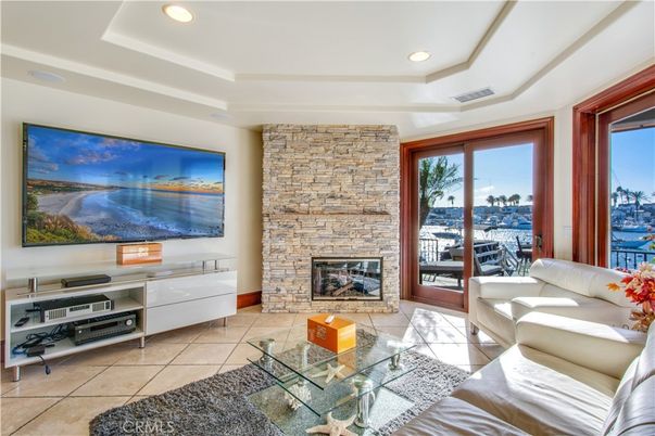 Fireplace, Interior, Living room, Recessed Lighting, Stone Walls, Water