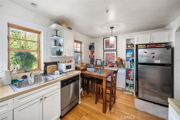 Dining room, Interior, Kitchen, Pendant Lights, Stainless Steel Appliances, Wood Texture Flooring