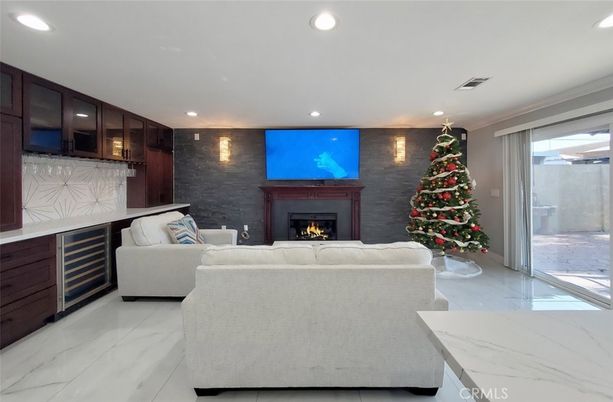 Fireplace, Interior, Living room, Marble, Recessed Lighting, Stone Walls