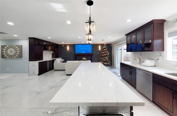 Fireplace, Interior, Kitchen, Living room, Marble, Pendant Lights, Recessed Lighting, Stainless Steel Appliances