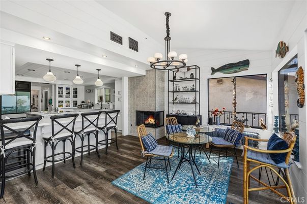 Chandelier, Dining room, Fireplace, Interior, Kitchen, Living room, Pendant Lights, Recessed Lighting, Wood Texture Flooring