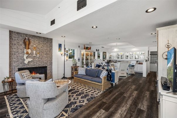 Fireplace, Interior, Living room, Pendant Lights, Recessed Lighting, Stone Walls, Wood Texture Flooring