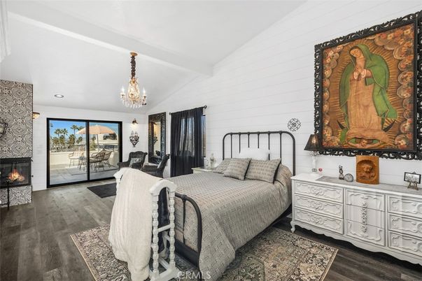 Bedroom, Chandelier, Fireplace, Interior, Pendant Lights, Recessed Lighting, Wood Texture Flooring