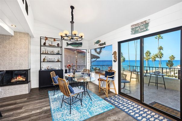 Chandelier, Dining room, Fireplace, Interior, Water, Wood Texture Flooring