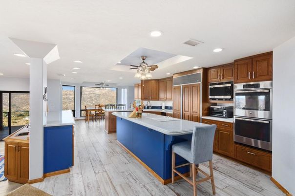 Dining room, Interior, Kitchen, Recessed Lighting, Stainless Steel Appliances, Wood Texture Flooring
